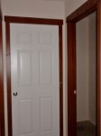 Hallway closet and guest bathroom