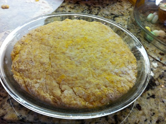 Into the pie dish...